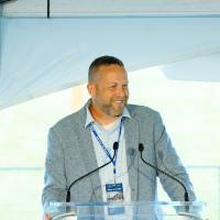 Matt Mitchell speaking at the Jamie Hosford Football Center dedication.